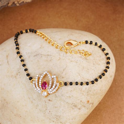 Shimmering Floret American Diamond CZ Golden Brass Black Beaded Mangal ...