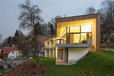 House On A Slope by 3 Storey Home On Steep Slope With Grass Roofed Garage House On A Slope