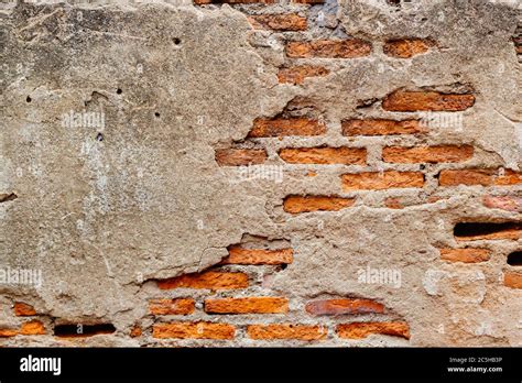 Weathered old ruin concrete wall reveal brick cracked inside grunge ...