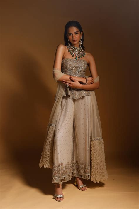 Nude Hand Embroidered Pepum Corset With Sharara And Smocked Stole ...