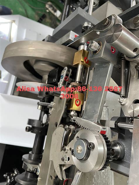 Image result for Tag Stringing Machine