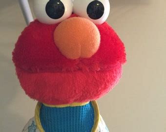 Burn Elmo Toy 的图像结果