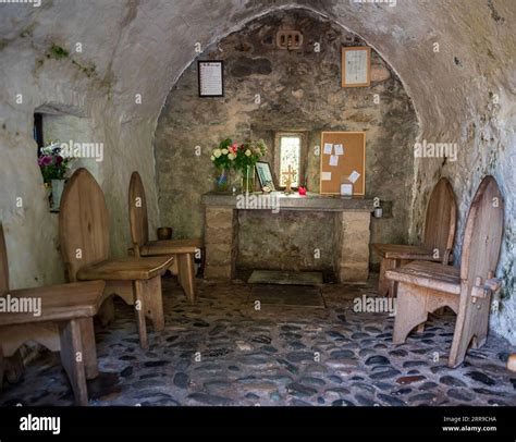 The tiny interior of St TRillo's chapel in Colwyn Bay North Wales. The smallest church in the ...