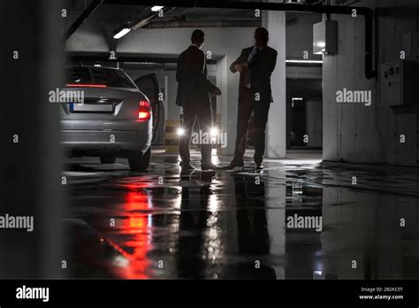 Man in a Business Suit in a Mall Parking Lot 的图像结果