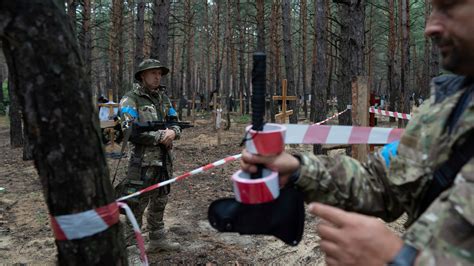 Ukrainian prosecutors work to document evidence of war crimes in Kharkiv. - The New York Times