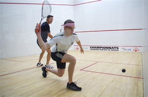 Squash game training, players with rackets - Body Bouge