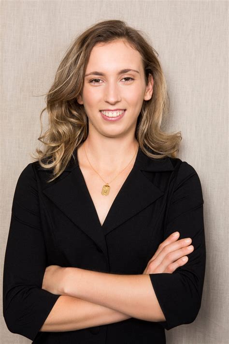 Download Elise Mertens Smiling Arms Crossed Wallpaper | Wallpapers.com