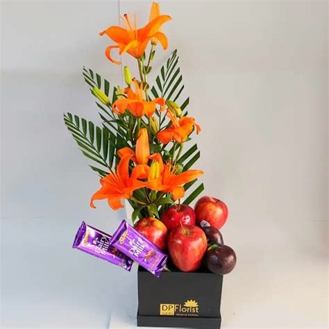 Fresh Fruit, Chocolates & Lillies Flowers In Box - DP Saini Florist ...