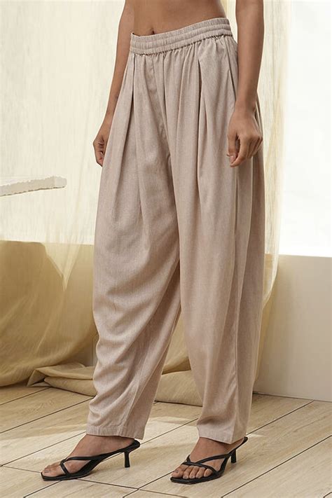 Buy Beige Solid Straight Palazzos Online at Biba India