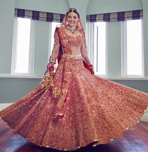 Kajal Aggarwal's red Anamika Khanna bridal lehenga featured stunning ...