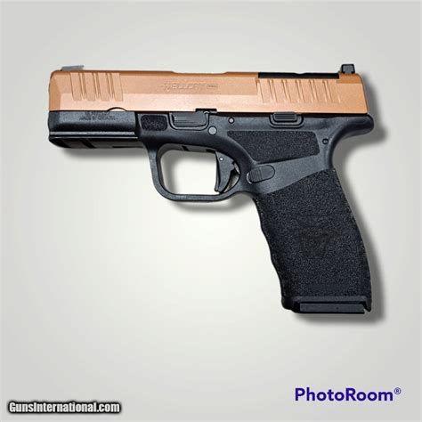 Image result for Disassembling a Springfield Hellcat