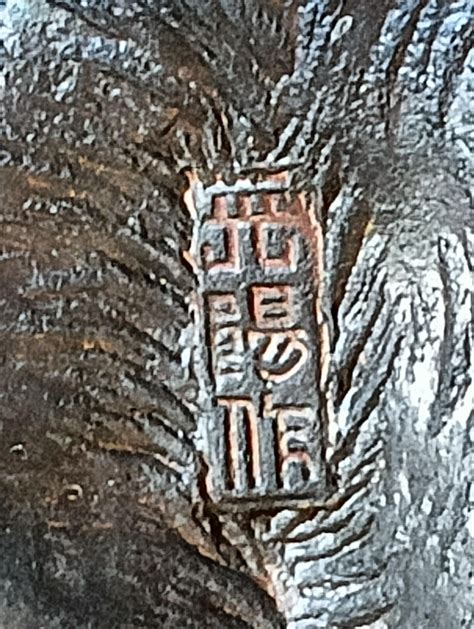 [Unknown>English] Need help to translate makers mark on a bronze tiger ...