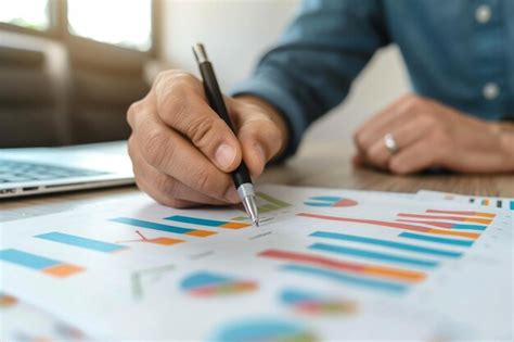 Businessman draw growth graph and progress of business and analyzing ...