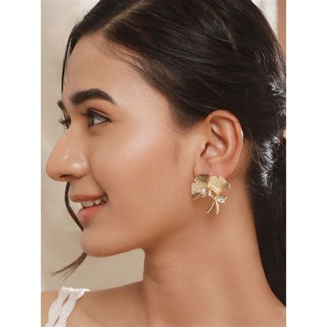 Buy Aatmana Gold Plated Pearl and American Diamond Studded Contemporary ...