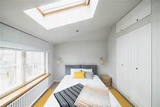 Go Black Or White In These Two Sloped Ceiling Apartmentshome Designing by Go Black Or White In These Two Sloped Ceiling Apartments Go Black Or White In These Two Sloped Ceiling Apartmentshome Designing