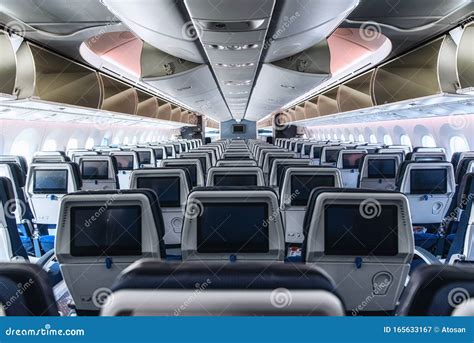Cabin Interior of a Modern Passenger Aircraft Wide Body Stock Image ...