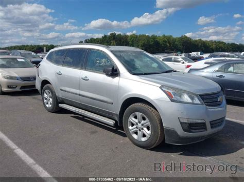 Report 1GNKRFED2FJ331895 CHEVROLET TRAVERSE 2015 Silver Gasoline - price and damage history