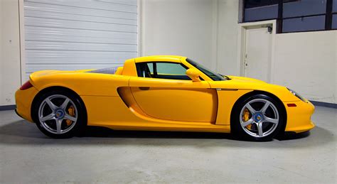 2005 Porsche Carrera GT Fayence Yellow - 572 miles | Sloan Motor Cars