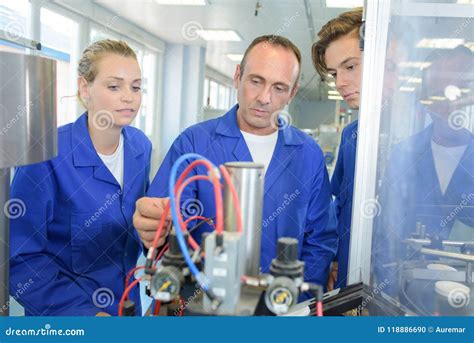 The Machine Operator Just Watching Another Machine Operator Working 的图像结果
