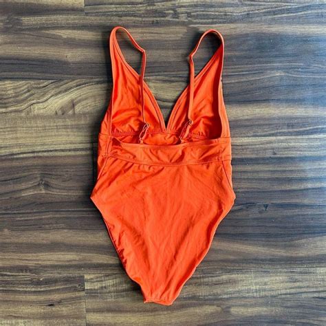 Monday Swimwear Orange One Piece Swimsuit in size... - Depop
