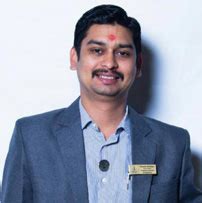 Incharge of the office at Mumbai, a member of the Institute having ...