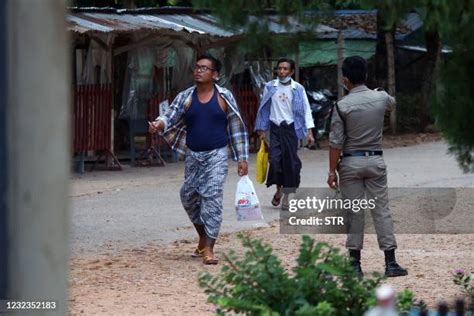 A released prisoner, right, is welcomed by her colleague after she was released from Insein Prison Sunday, Jan. 4, 2026, in Yangon, Myanmar. (AP Photo/Thein Zaw)