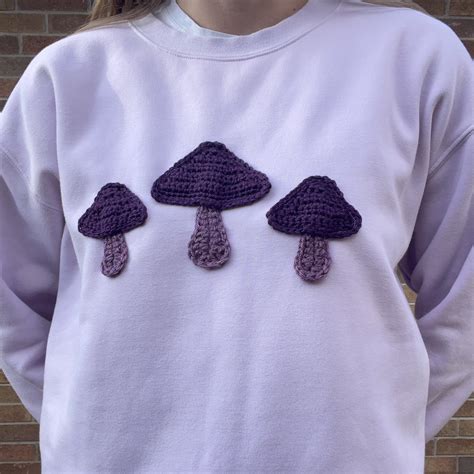 Light purple sweatshirt with handmade purple... - Depop
