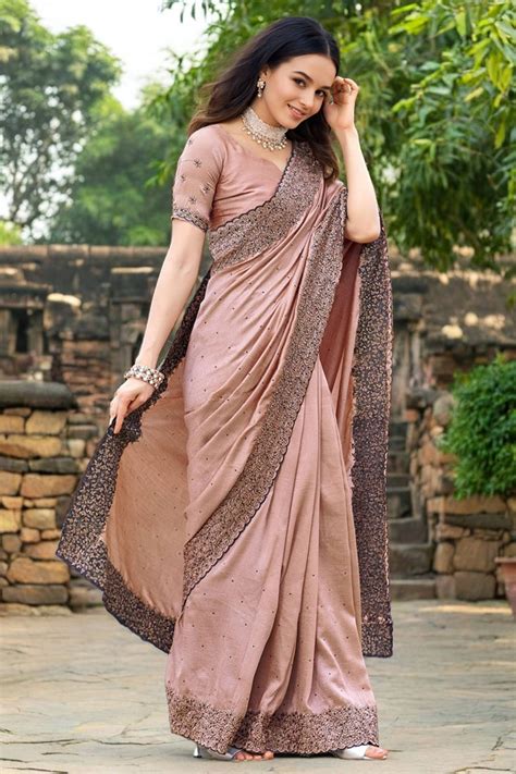 Peach Swarovski Work Rangoli Dola Silk Saree With An Eye Catching Bord
