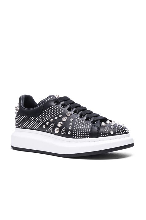 Alexander McQueen Studded Union Jack Larry Leather Sneakers in Black | FWRD