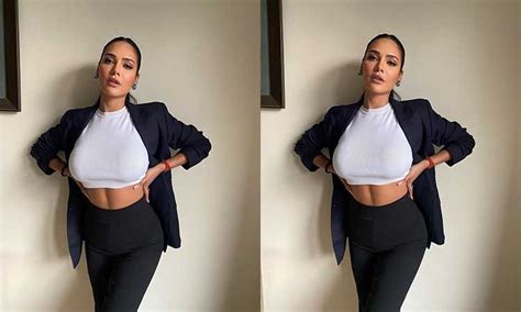 Esha Gupta flaunts her toned figure in pink pantsuit with a cleavage ...