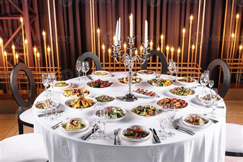 Elegant dinner table setup with candlelight 45605060 Stock Photo at ...