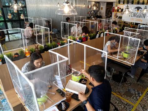 Covid-19: Our world re-engineered for social distancing - Eating while ...