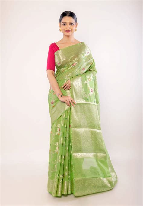 Green Art Silk Saree with Golden and Pink Floral Motifs