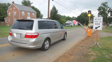 Automated flagger making construction zones safer for workers