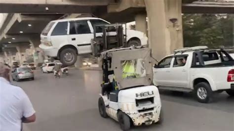 England fans can’t help laughing at car removed by forklift instead of ...