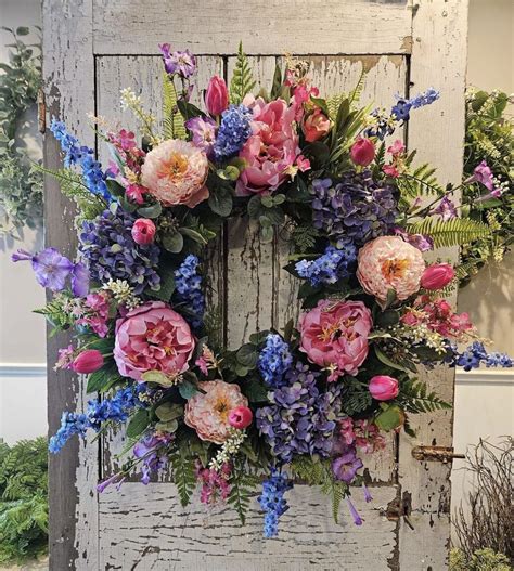 Pin by TINA TURNER on wreaths and swags in 2025 | Spring floral wreath ...