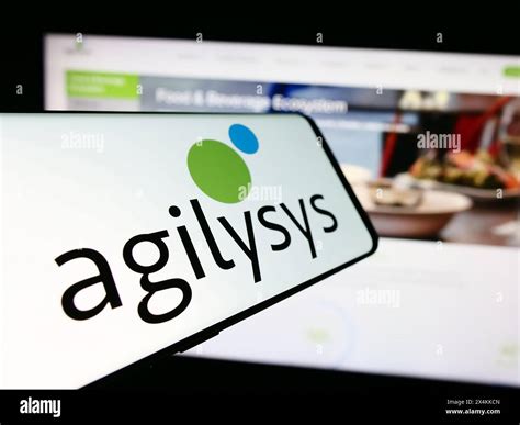 Smartphone with logo of American enterprise software company Agilysys ...