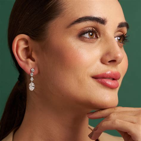 The Galactic Teardrop Parure | white-gold earrings with EF color and V ...