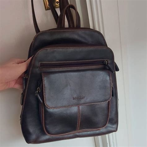 Beautiful brown backpack. Small-medium sized, zip... - Depop