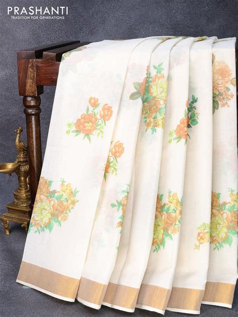 Cotton saree off white and with allover floral prints and zari woven ...