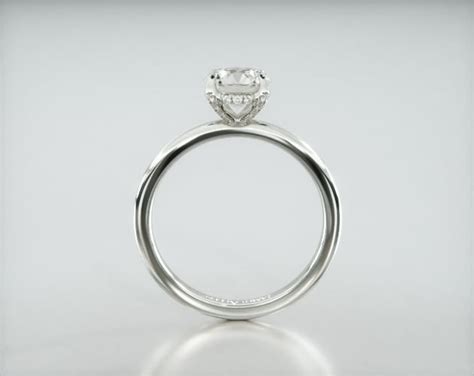 Solitaire Engagement Ring Embellished With a Classic Pavé Basket Head ...