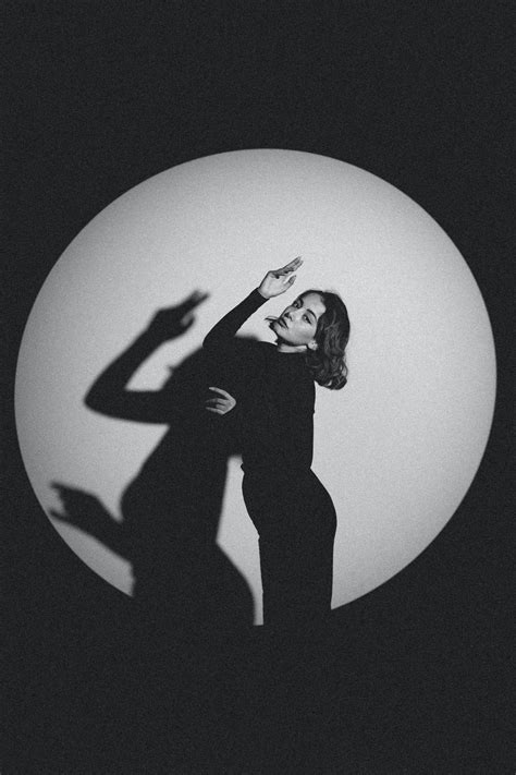 Young Woman Posing in a Bikini and Shirt on the Beach · Free Stock Photo