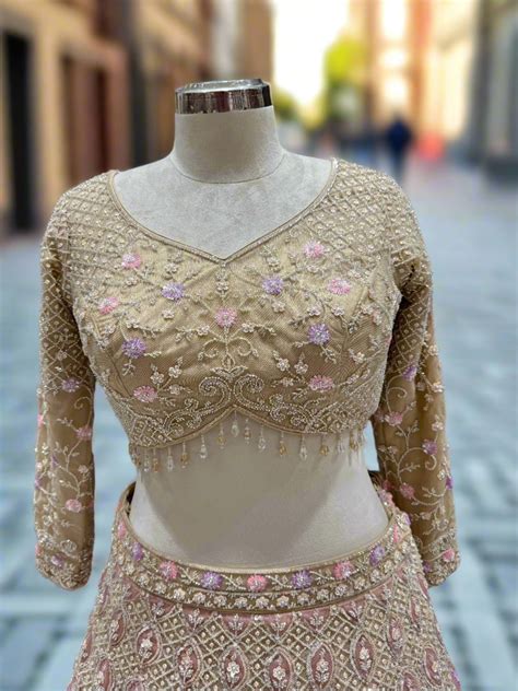 Soft Gold Embroidered Net Lehenga – Chhabra 555