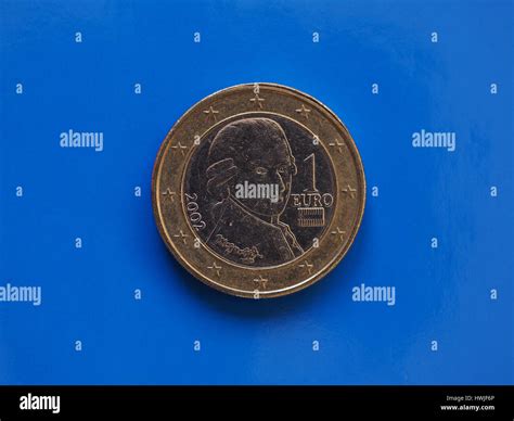 1 euro coin money (EUR), currency of European Union, Austria over blue background Stock Photo ...