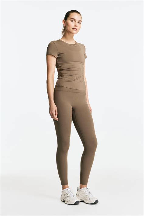 Sports top with DryMove™ - Dark beige - Ladies | H&M IN