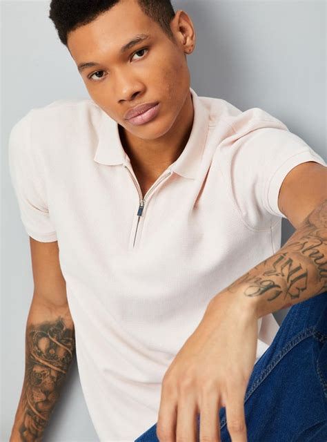 Buy Men Textured Zipper Polo T-shirt Online at just Rs. 699.0 ...