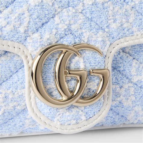 GG Marmont mini shoulder bag in light blue and white GG bouclé | GUCCI® US