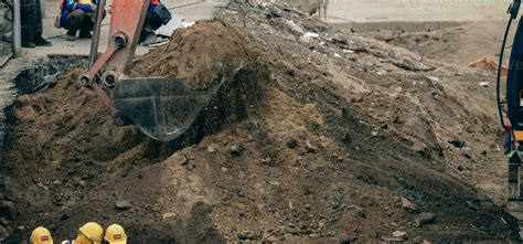 Image result for Backhoe Digging Hole