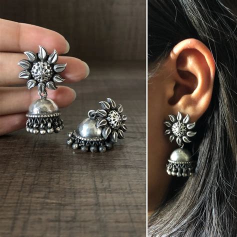 Antique finish flower studs with hammered jhumkas in pure silver ...
