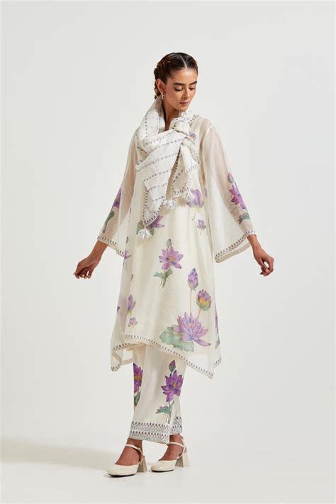 Off white cotton chanderi A-line kurta set features with all-over purp ...